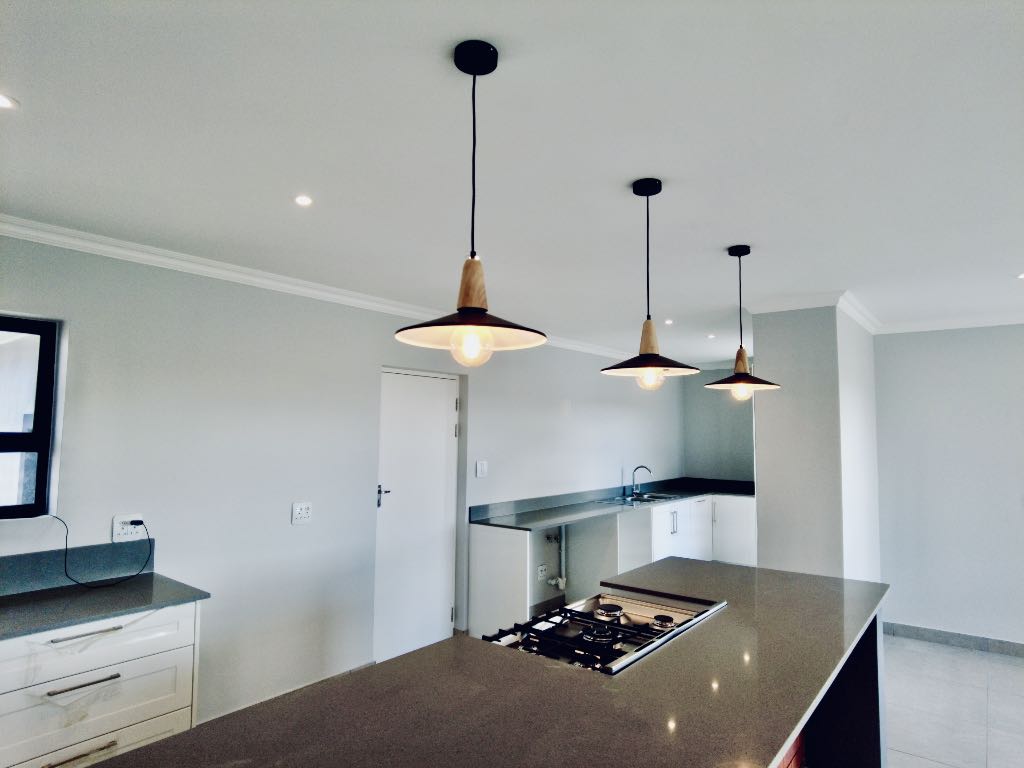 Uncluttered working areas in the kitchen.