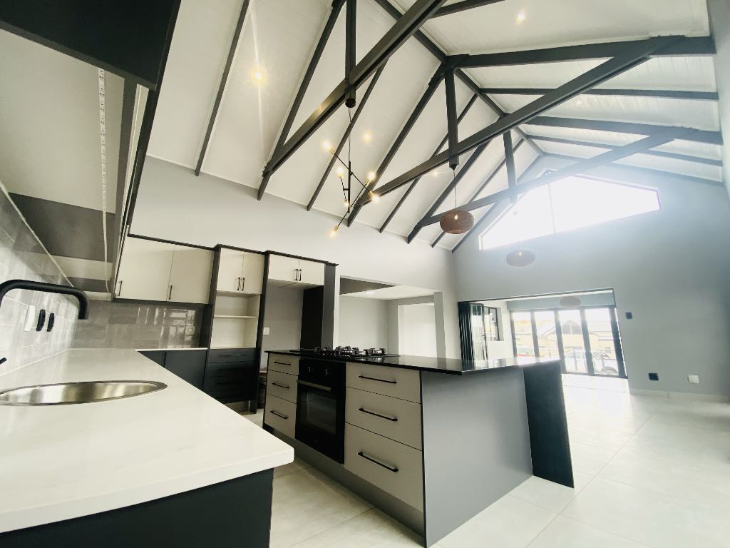 Height is achieved by making without traditional ceilings.